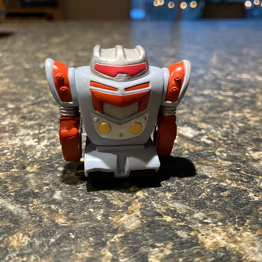 Red and Silver Robot Toy